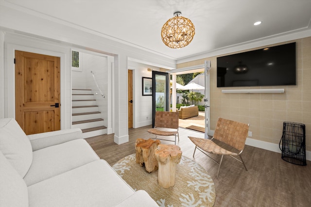 living area featuring recessed lighting, stairway, a chandelier, baseboards, and wood finished floors