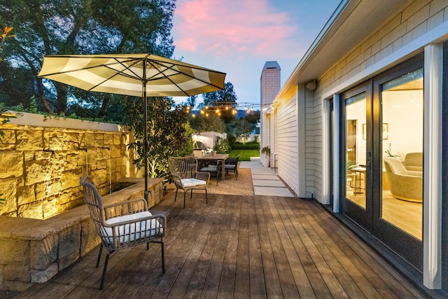 view of deck at dusk