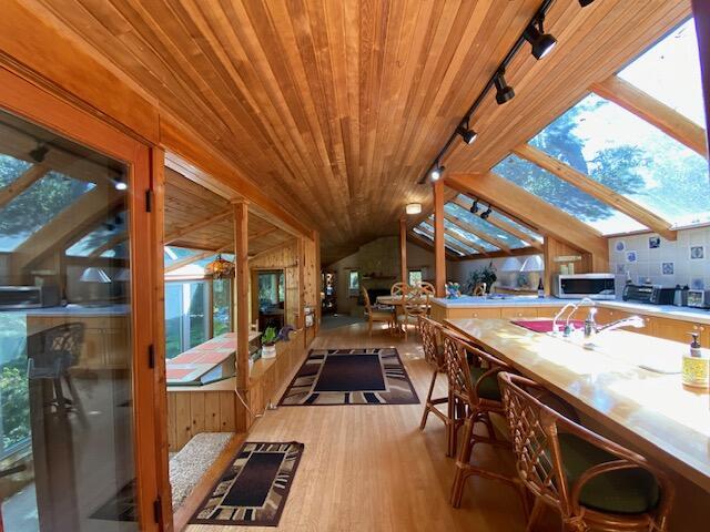 1040 Mission Canyon Rd, Santa Barbara, CA 93105 - sunroom / solarium with rail lighting and vaulted ceiling