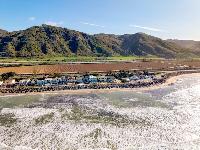 view of mountain feature with a beach view