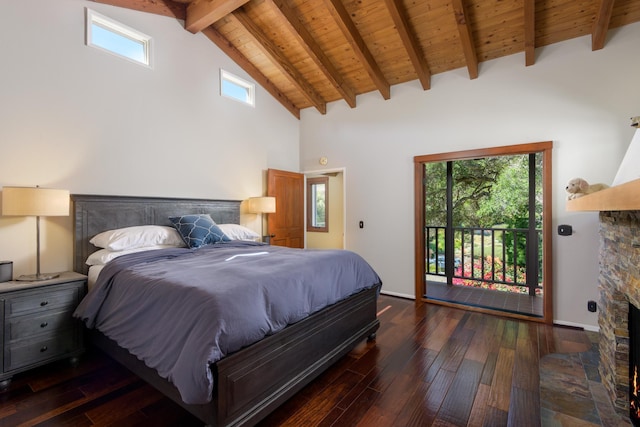 bedroom featuring a fireplace, access to exterior, wood ceiling, and hardwood / wood-style floors