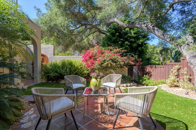 view of patio with fence