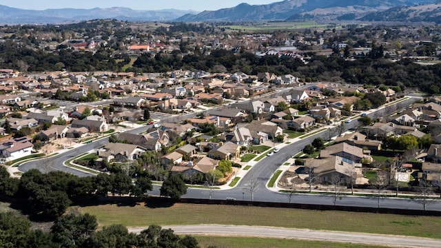 aerial view with a mountain view and a residential view