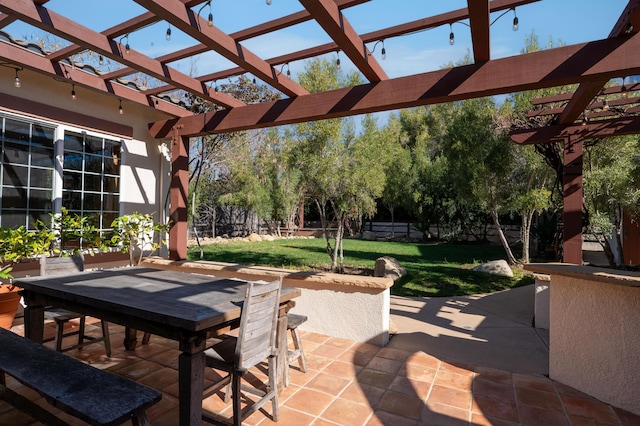 view of patio / terrace with a pergola and outdoor dining area