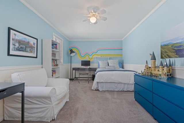 bedroom with crown molding, ceiling fan, and carpet
