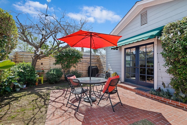 view of patio / terrace featuring outdoor dining area and french doors