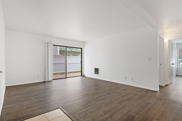 39 Dearborn Pl Unit 95, Goleta, CA 93117 - spare room with dark wood-style floors, plenty of natural light, and baseboards