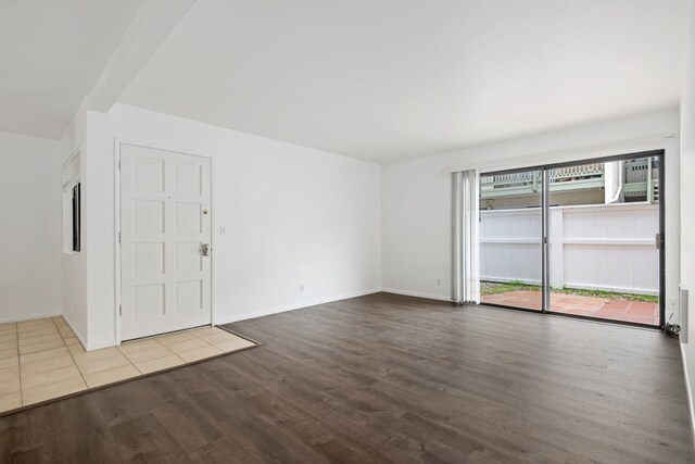 39 Dearborn Pl Unit 95, Goleta, CA 93117 - empty room with wood finished floors and baseboards
