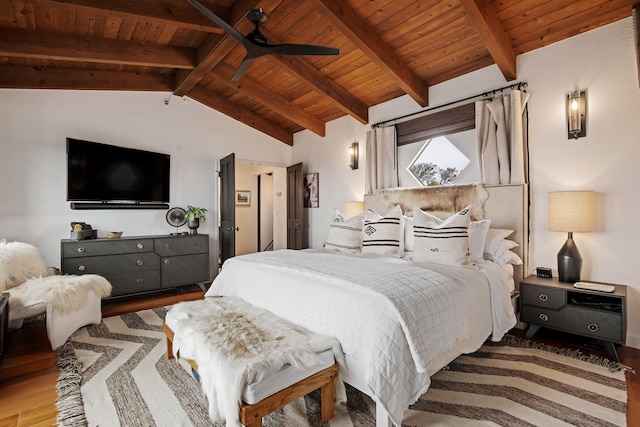 bedroom featuring vaulted ceiling with beams, wood ceiling, and wood finished floors