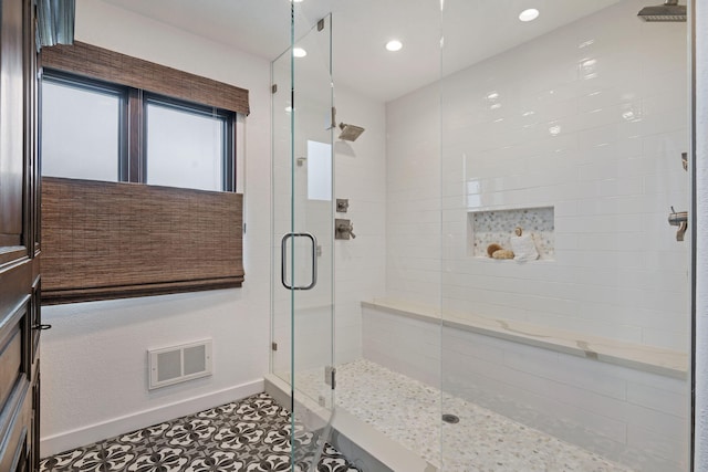 bathroom with tile patterned flooring, recessed lighting, baseboards, visible vents, and a stall shower
