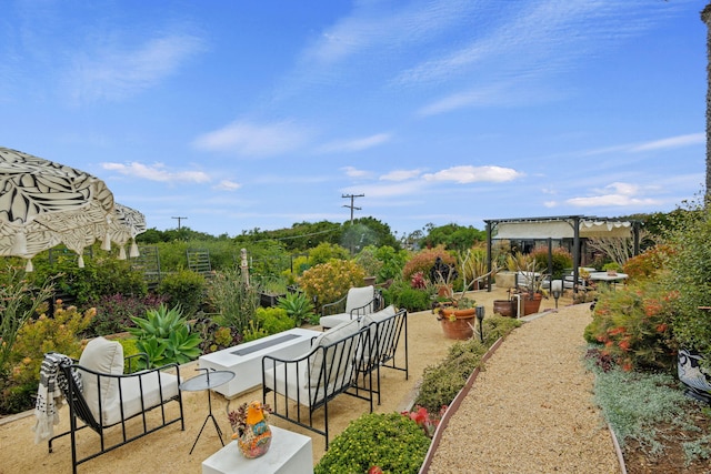 surrounding community featuring a patio area