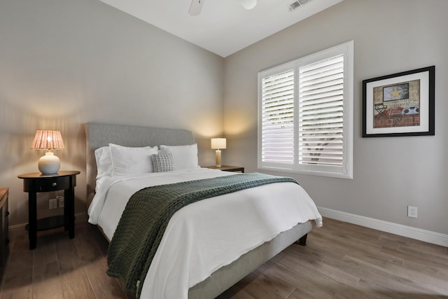 80220 Vía Tesoro, Tesoro, CA 92253 - bedroom with a ceiling fan, baseboards, visible vents, and wood finished floors