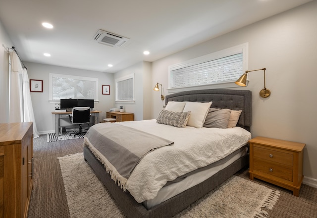 carpeted bedroom with visible vents, recessed lighting, and baseboards