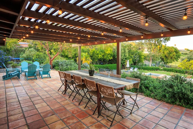 view of patio with outdoor dining area, a trampoline, fence, and a pergola