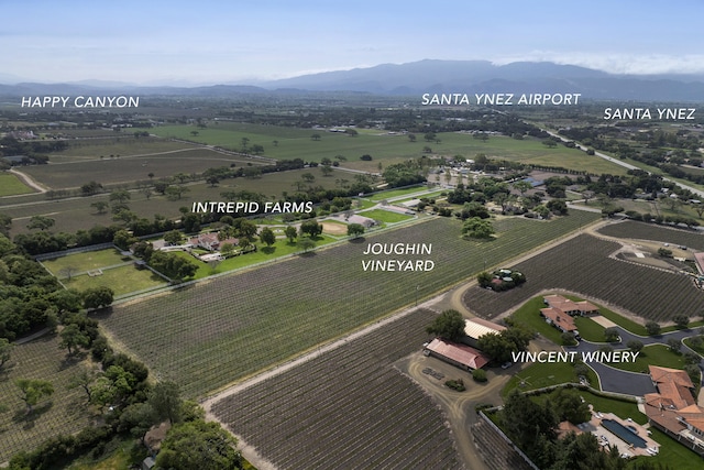 aerial view with a rural view and a mountain view