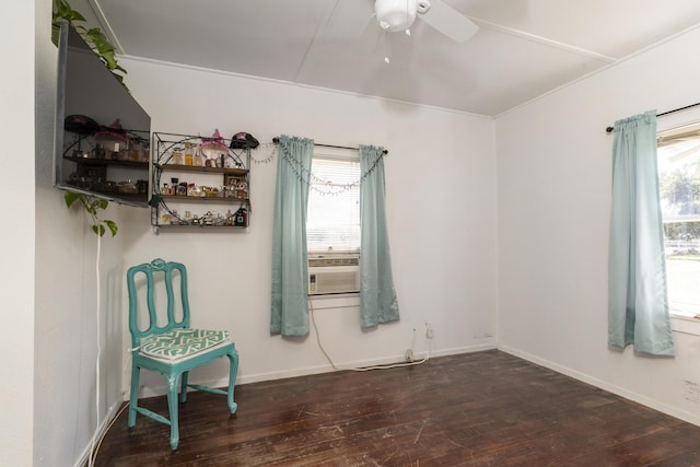unfurnished room featuring ceiling fan, baseboards, and hardwood / wood-style flooring