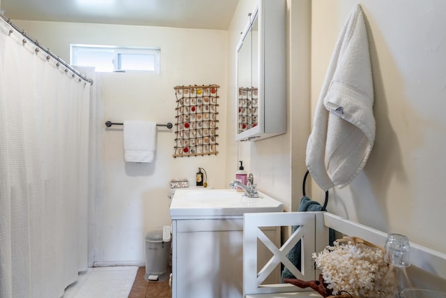 full bath featuring vanity, tile patterned floors, and a shower with curtain