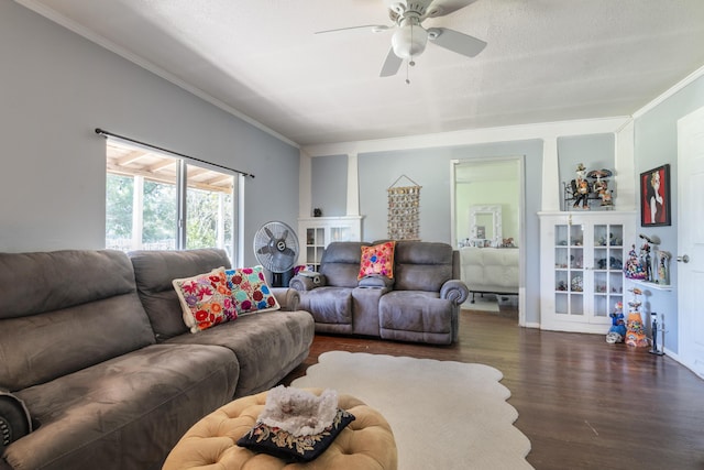 living room with crown molding, ceiling fan, and wood finished floors