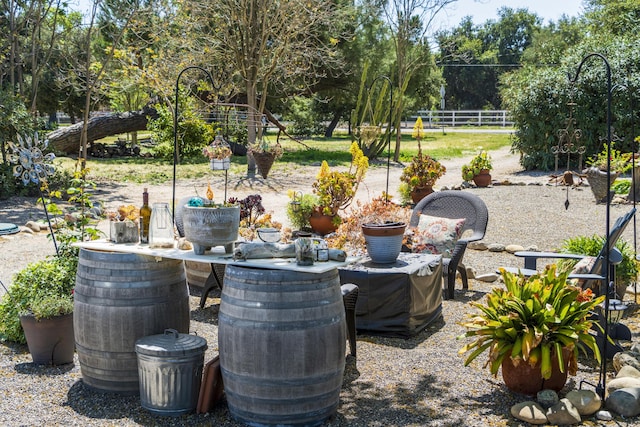 view of patio featuring fence