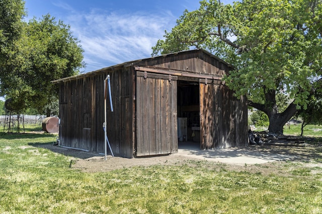 view of outbuilding featuring an outdoor structure