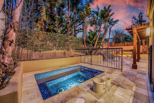1158 Shelburn Ln, Ventura, CA 93001 - pool at dusk with a patio and a fenced backyard