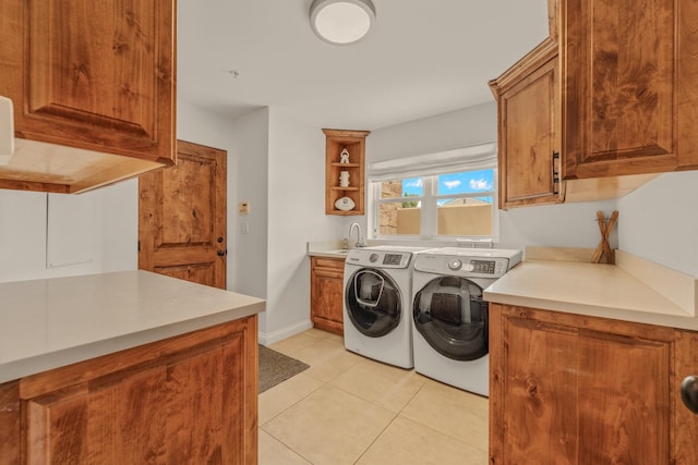 1158 Shelburn Ln, Ventura, CA 93001 - laundry area with independent washer and dryer, a sink, light tile patterned floors, and cabinet space