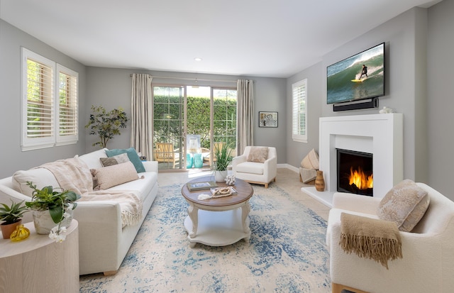 232 Sanderling Ln, Goleta, CA 93117 - living area with tile patterned floors, baseboards, a lit fireplace, and recessed lighting