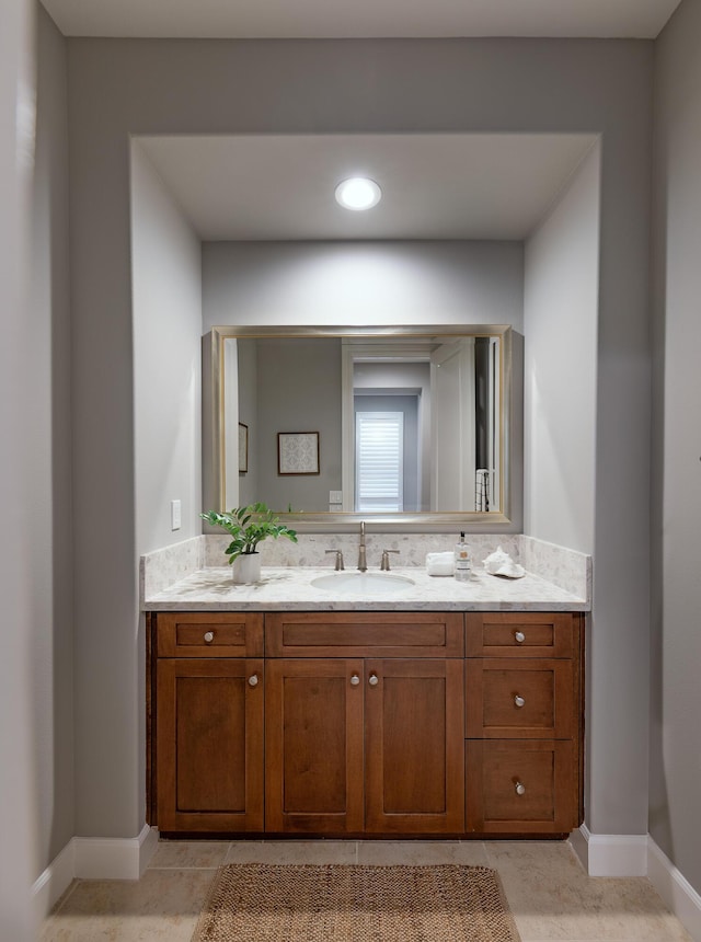 232 Sanderling Ln, Goleta, CA 93117 - bathroom with vanity, baseboards, and tile patterned floors