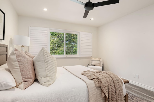 bedroom featuring wood finished floors, baseboards, recessed lighting, and a ceiling fan
