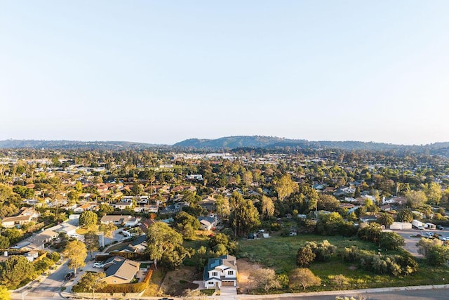 drone / aerial view with a residential view and a mountain view