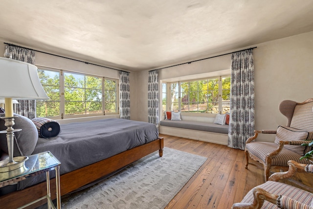 3325 Figueroa Mountain Rd, Los Olivos, CA 93460 - bedroom featuring multiple windows and wood-type flooring