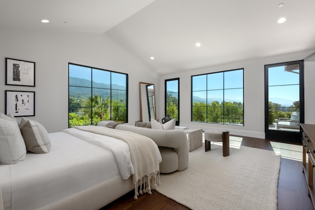 bedroom featuring vaulted ceiling, dark wood-style floors, and recessed lighting