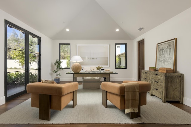 living area featuring lofted ceiling, a wealth of natural light, and recessed lighting