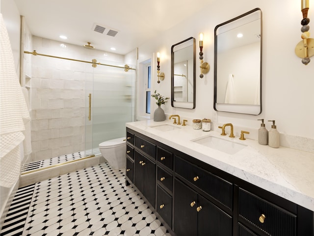 23 Calaveras Ave, Goleta, CA 93117 - full bathroom with a sink, double vanity, a stall shower, and visible vents