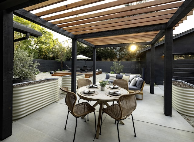 23 Calaveras Ave, Goleta, CA 93117 - view of patio featuring outdoor dining space, a pergola, and a fenced backyard