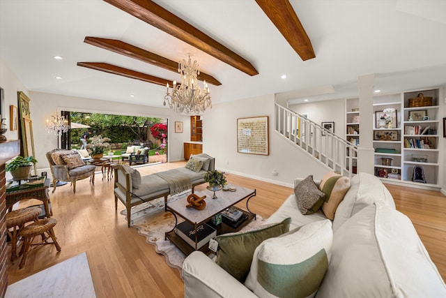 305 E Islay St, Santa Barbara, CA 93101 - living room featuring stairway, an inviting chandelier, light wood finished floors, and beam ceiling