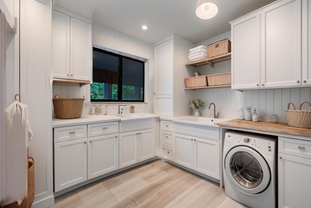 904 E Fir Ave, Lompoc, CA 93436 - laundry room with washer / dryer, cabinet space, recessed lighting, and light wood-style flooring