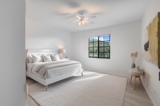 904 E Fir Ave, Lompoc, CA 93436 - bedroom featuring light wood-style flooring, baseboards, and a ceiling fan