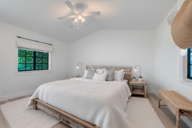 904 E Fir Ave, Lompoc, CA 93436 - bedroom featuring multiple windows, wood finished floors, lofted ceiling, ceiling fan, and baseboards