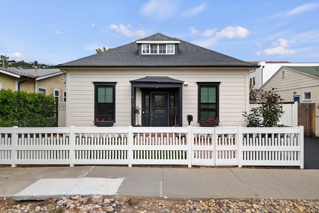 910 N Nopal St, Santa Barbara, CA 93103 - bungalow with a fenced front yard and a shingled roof
