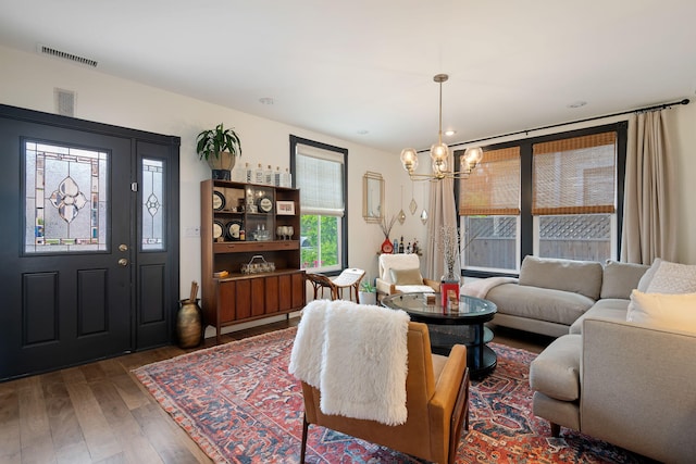 910 N Nopal St, Santa Barbara, CA 93103 - living area with hardwood / wood-style flooring and a chandelier