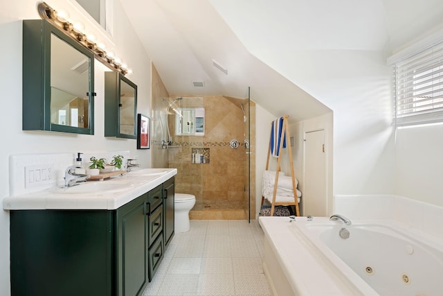 910 N Nopal St, Santa Barbara, CA 93103 - full bath featuring tile patterned floors, a whirlpool tub, a stall shower, double vanity, and toilet