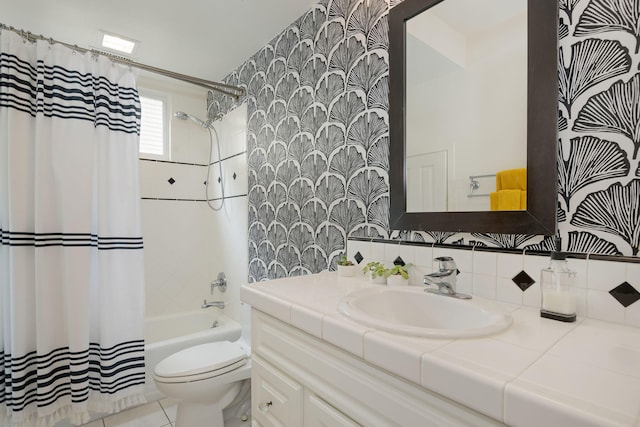 910 N Nopal St, Santa Barbara, CA 93103 - bathroom with toilet, vanity, shower / bath combo with shower curtain, and decorative backsplash