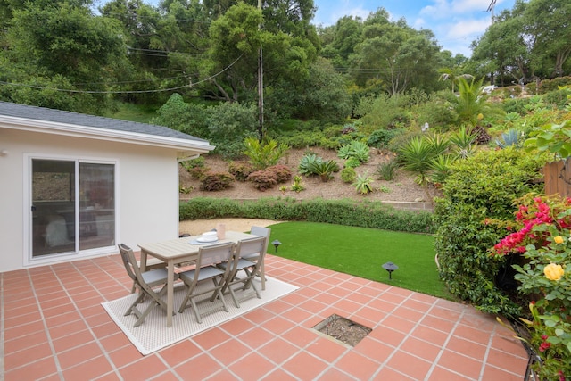 view of patio featuring outdoor dining space