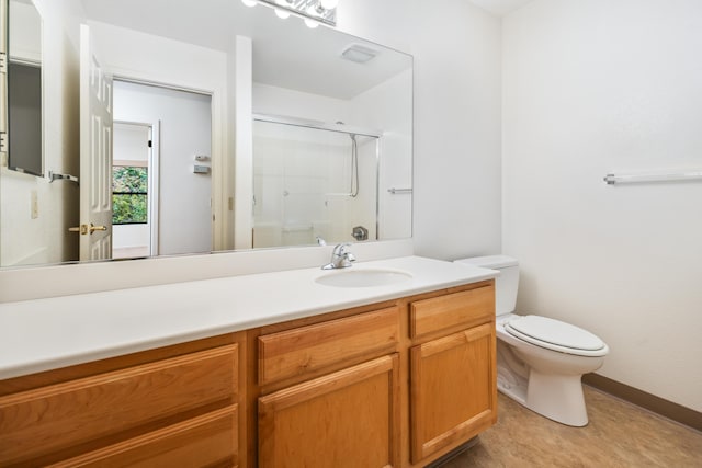 4643 Gerona Way, Santa Barbara, CA 93110 - full bathroom with a shower stall, toilet, vanity, and baseboards