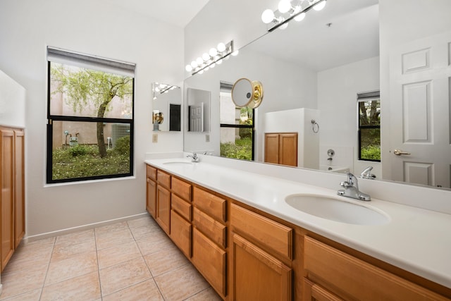 4643 Gerona Way, Santa Barbara, CA 93110 - bathroom featuring double vanity, tile patterned floors, and baseboards