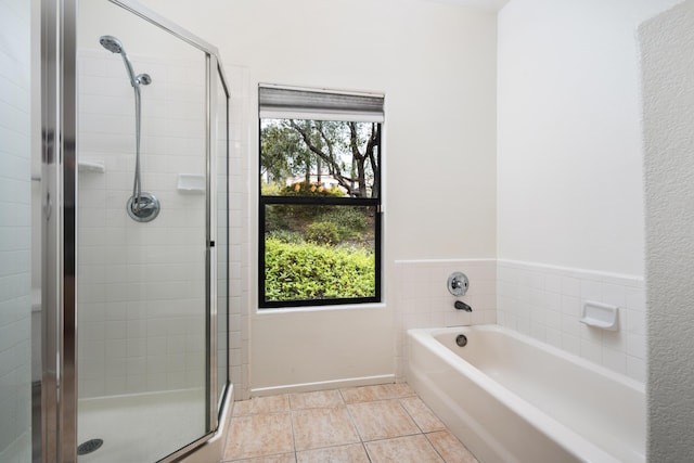 4643 Gerona Way, Santa Barbara, CA 93110 - bathroom featuring a stall shower, a bath, and tile patterned floors