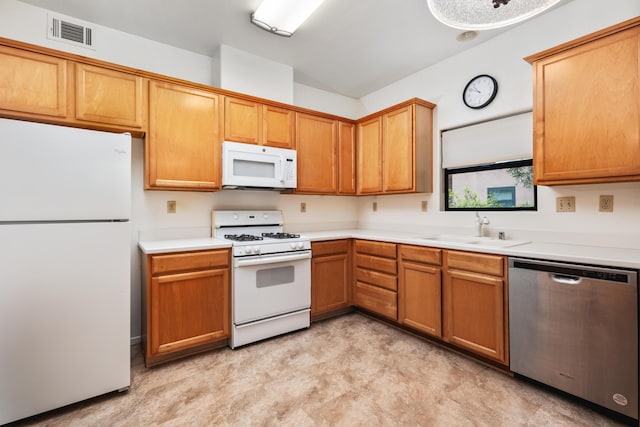 4643 Gerona Way, Santa Barbara, CA 93110 - kitchen featuring white appliances, a sink, light floors, and light countertops