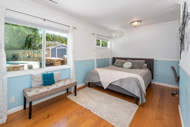 3933 Foothill Rd, Santa Barbara, CA 93110 - bedroom featuring wood-type flooring, ornamental molding, and baseboards