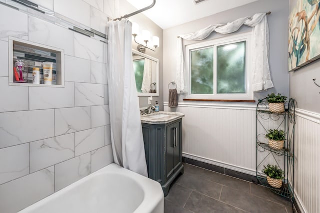 3933 Foothill Rd, Santa Barbara, CA 93110 - bathroom with vanity, shower / bathtub combination with curtain, wainscoting, and tile patterned floors